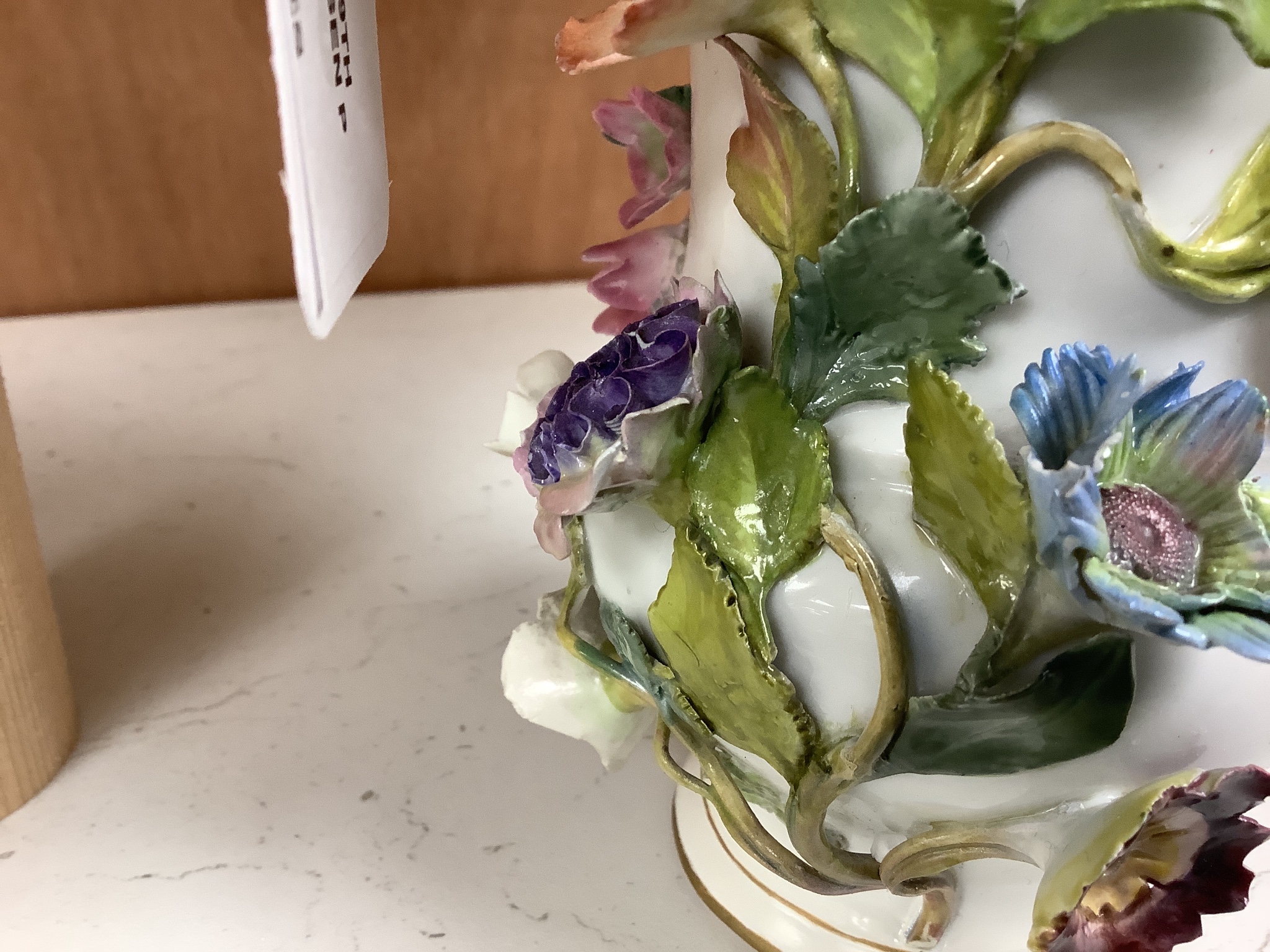 Two similar 19th century Meissen pot pourri vases and one cover, tallest 20cm